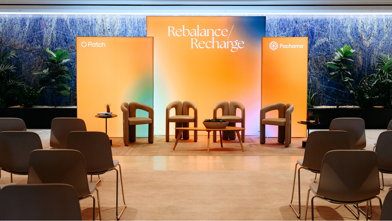 Event setup — speaker backdrop and signage